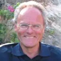 Dr. med. Boris Tolsdorff mit Brille und Hemd vor neutralem Hintergrund.